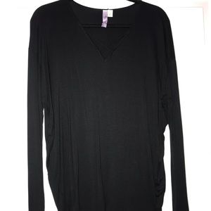 Black blouse, criss cross in the front